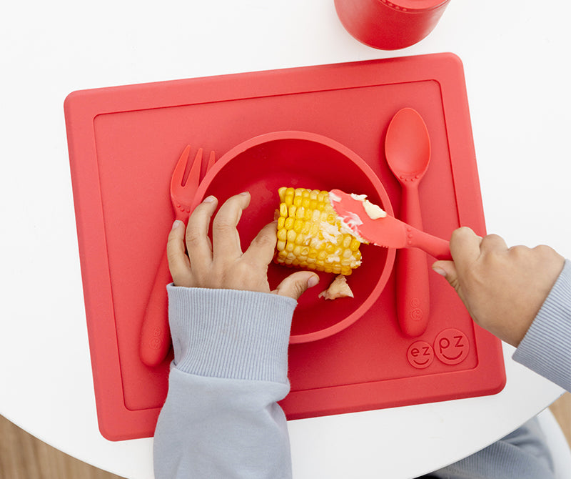 Tips for Teaching Toddlers With Down Syndrome to Use Utensils