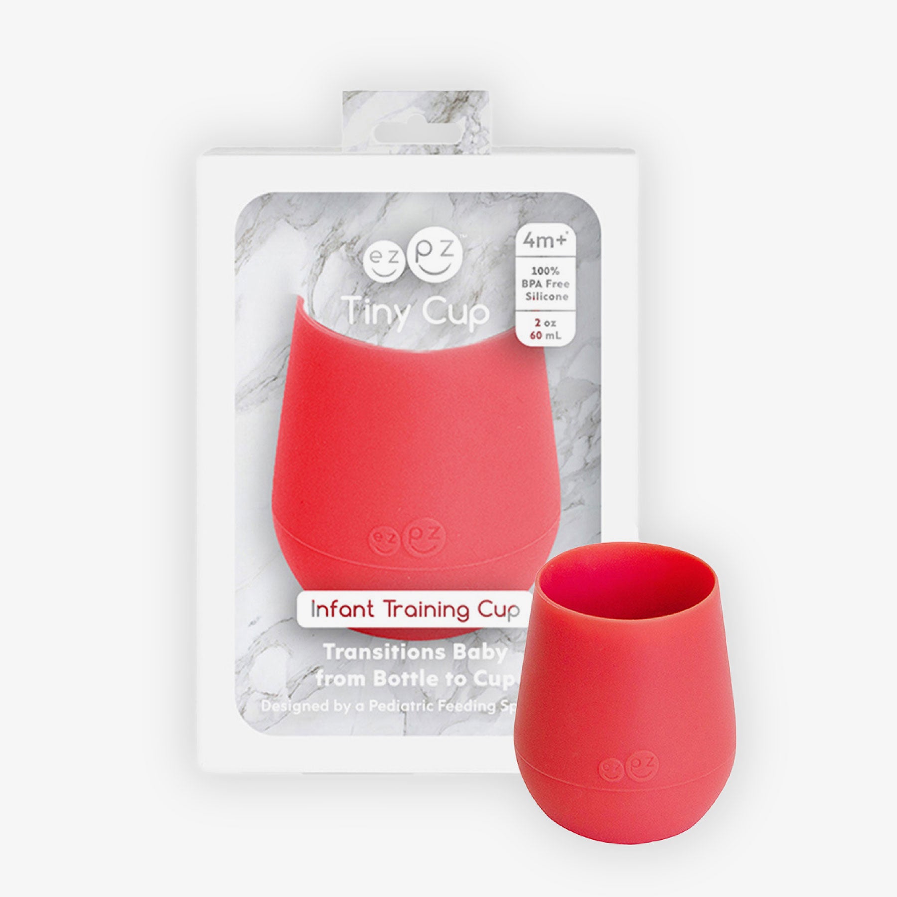The Tiny Cup in Coral Pink by ezpz / Open-Top, Silicone Drinking Cup for Babies to Learn to Drink