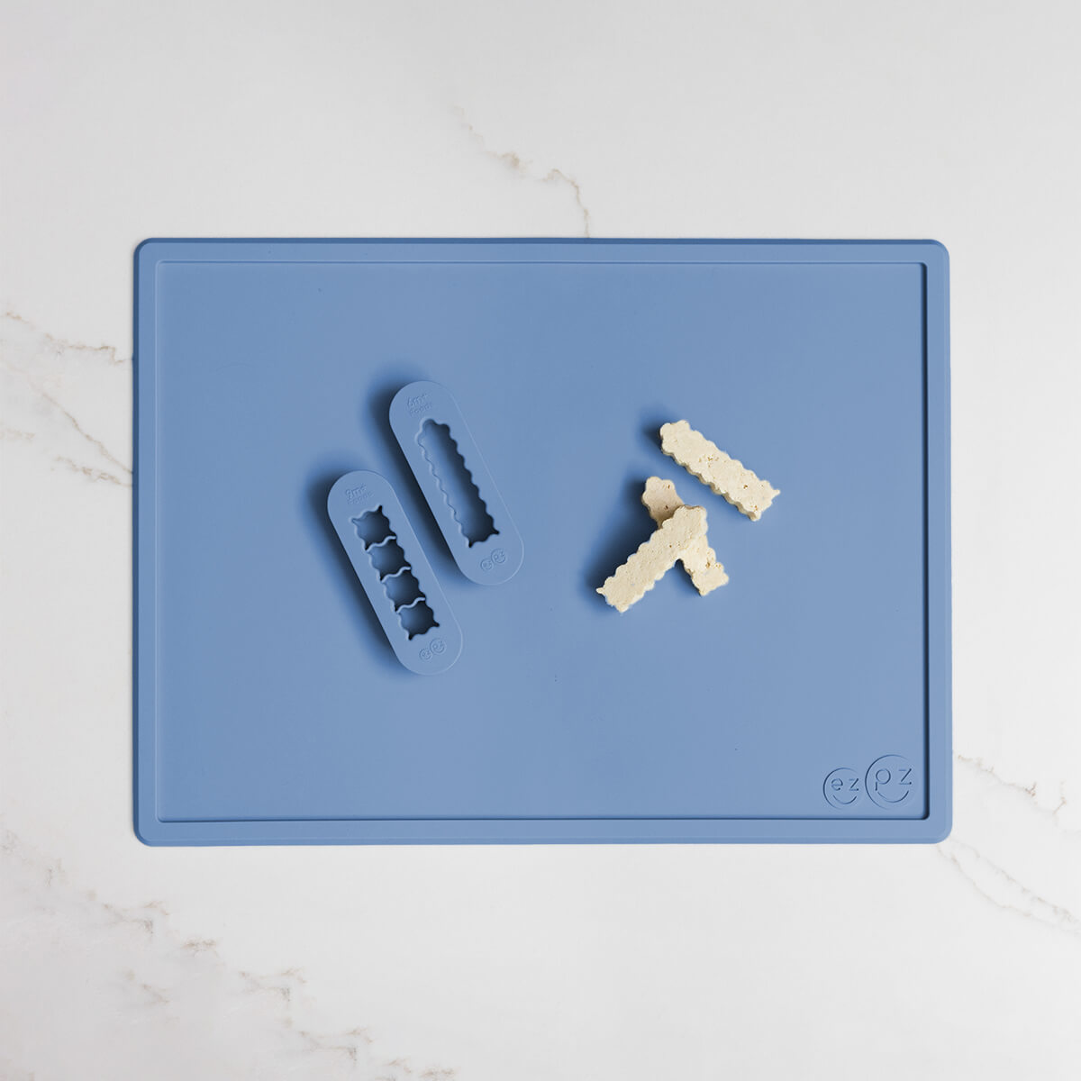 ezpz Baby-Led Weaning Food Cutters in Indigo Blue / 6 months and 9 months feeding milestones