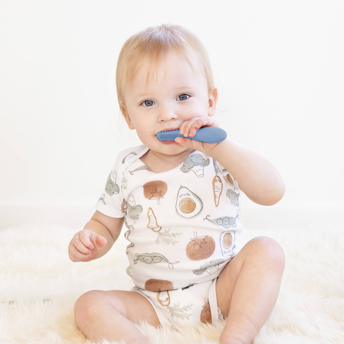 ezpz silicone baby led toothbrush in indigo blue