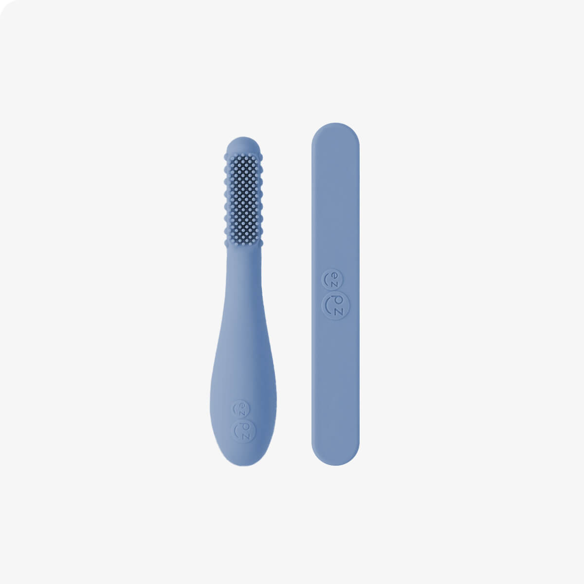 ezpz baby led toothbrush and sensory tongue depressor in indigo blue