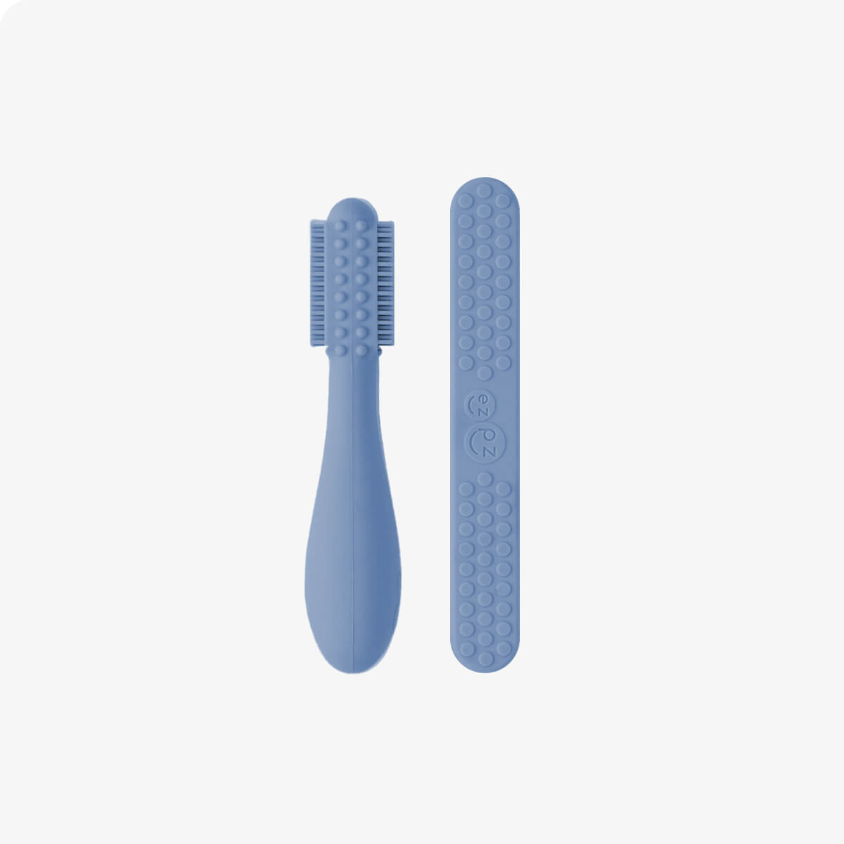 ezpz baby led toothbrush and sensory tongue depressor in indigo blue