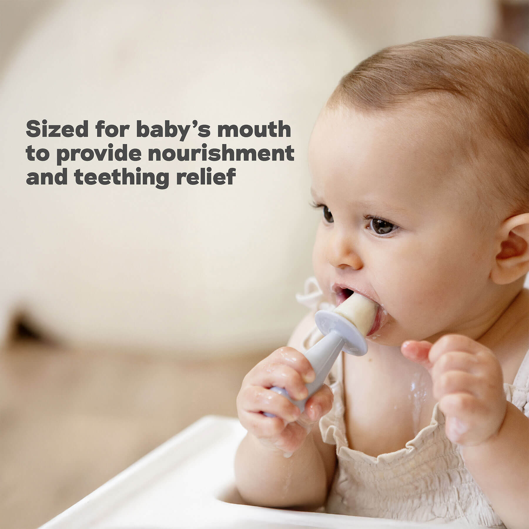 Tiny Pops by ezpz are silicone popsicle molds for breastmilk and formula, sized for baby's mouth to provide nourishment and teething relief