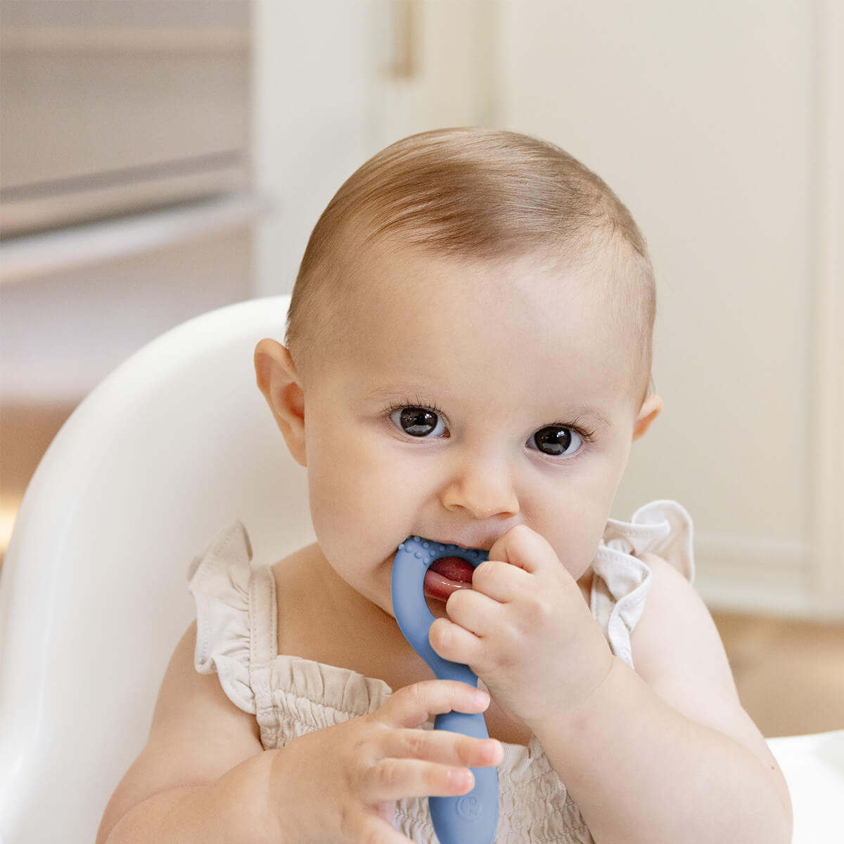 ezpz oral development tools in indigo / silicone teethers for motor skill development