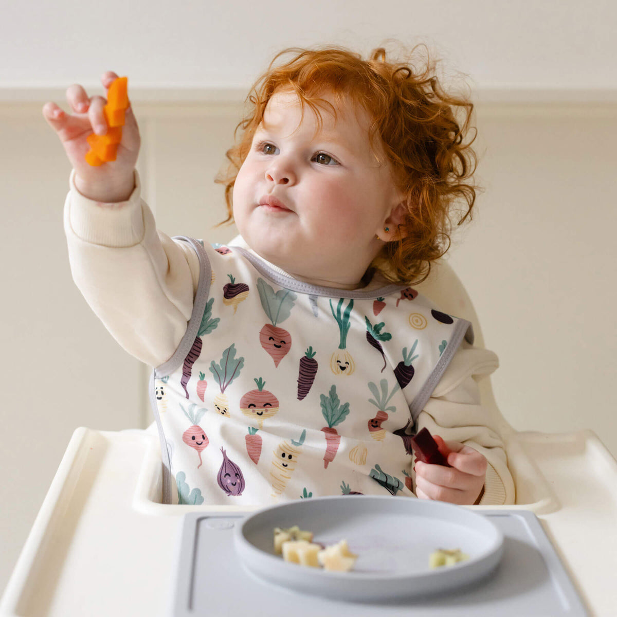 ezpz Baby-Led Weaning Festive Food Cutters to cut baby food into star and tree shapes Christmas-themed