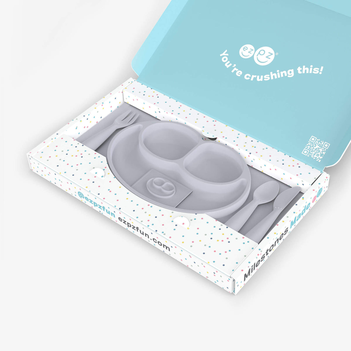 ezpz Kit 4 - Celebrate Mealtime Independence in Pewter Gray includes the Happy Mat, Happy Utensils, and Micro Mat