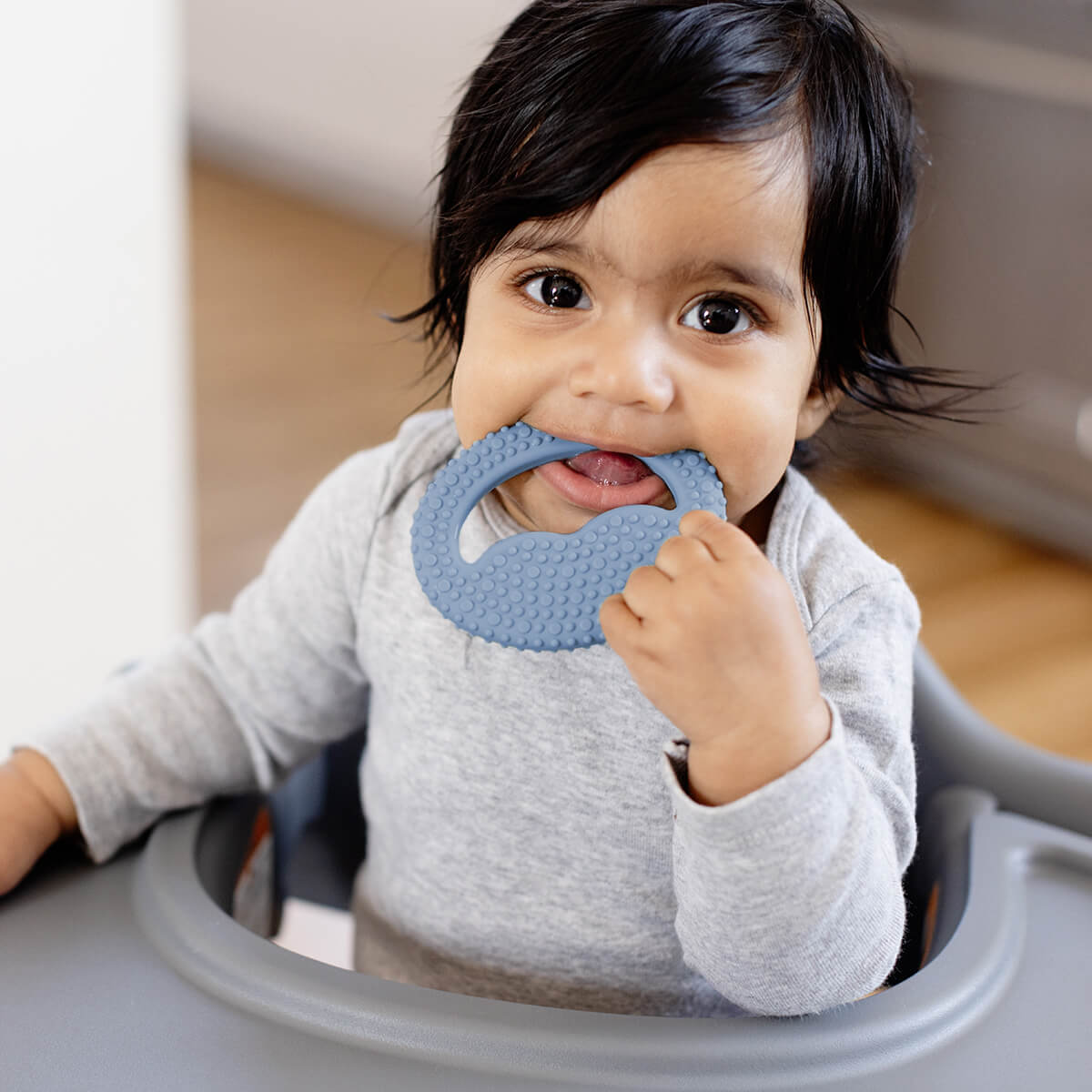 Pre-feeding set by ezpz in indigo blue includes the tiny pops (popsicle molds) and oral development tools (silicone teethers)