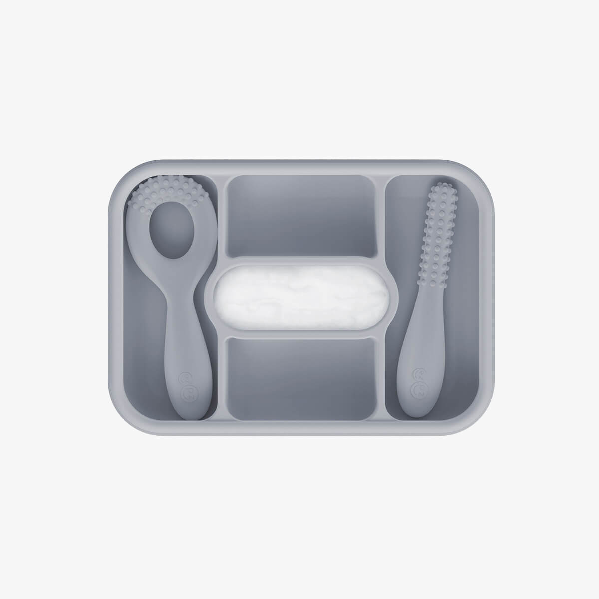 ezpz travel box in pewter gray is an all-in-one feeding + storage system that helps families pack, transport, and serve baby’s meals when away from home