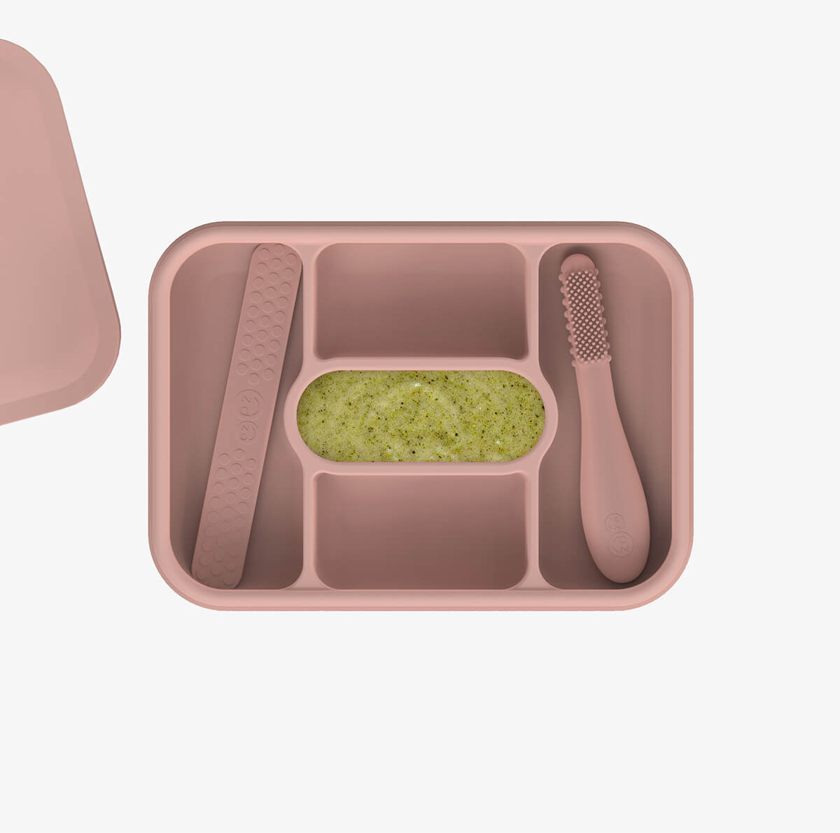 ezpz travel box in blush pink is an all-in-one feeding + storage system that helps families pack, transport, and serve baby’s meals when away from home