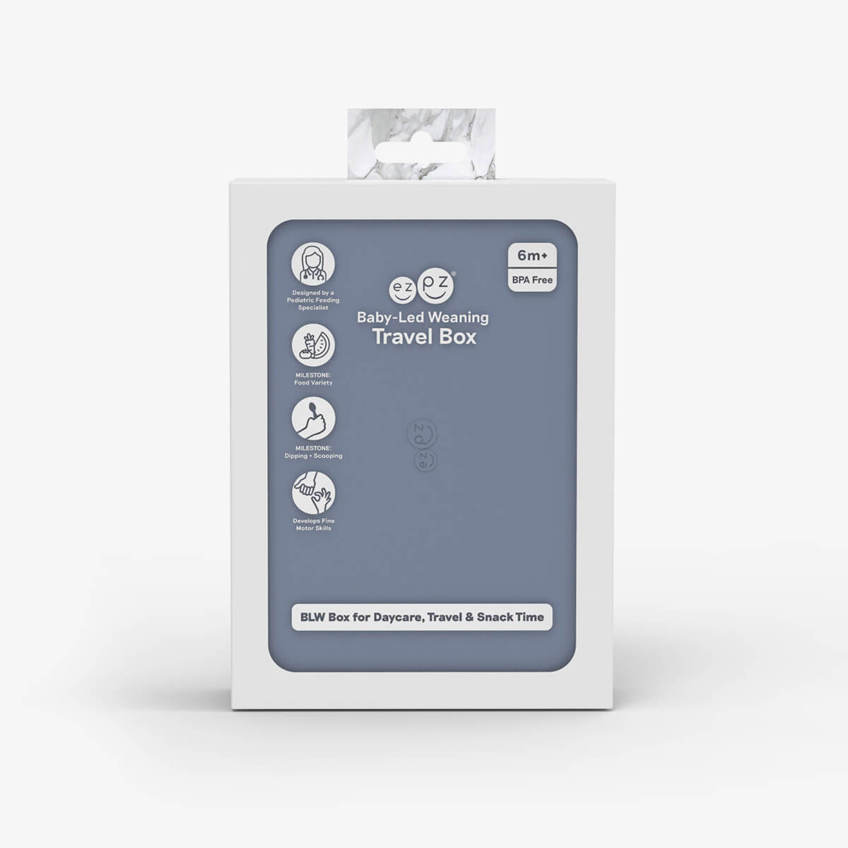 ezpz travel box in indigo blue is an all-in-one feeding + storage system that helps families pack, transport, and serve baby’s meals when away from home