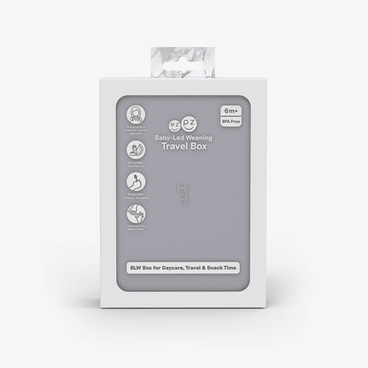 ezpz travel box in pewter gray is an all-in-one feeding + storage system that helps families pack, transport, and serve baby’s meals when away from home