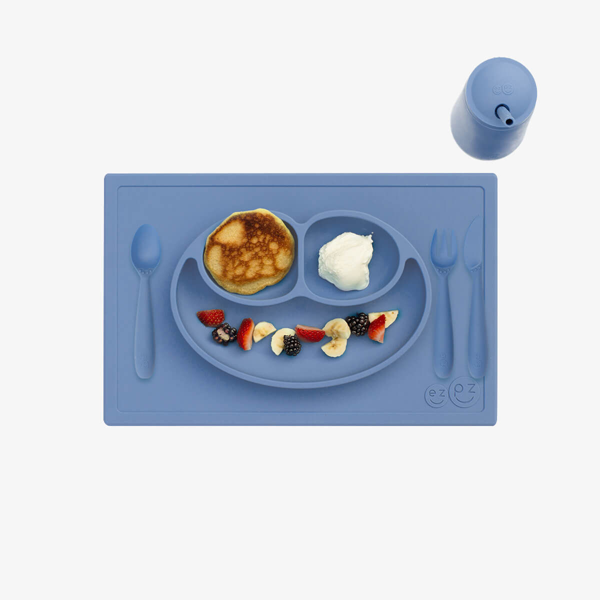 ezpz Happy Feeding Set in Indigo / Silicone, Self-Suctioning Plate, Silicone Cup and Straw, Training Utensils for Toddlers
