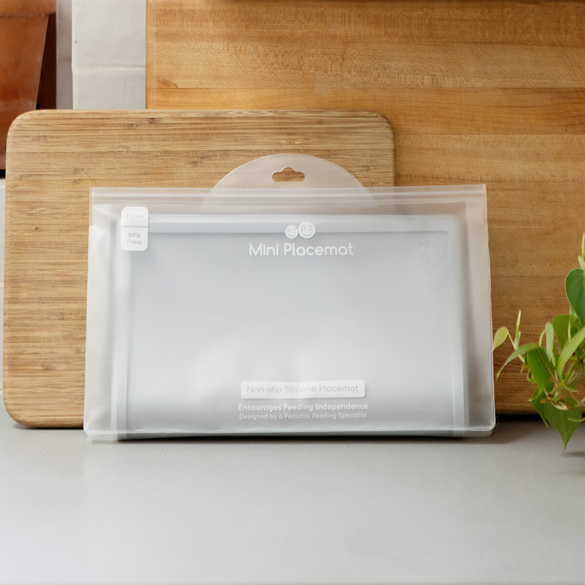 ezpz Mini Placemat in Pewter Gray is a silicone placemat for toddlers that grips to the table #color_pewter