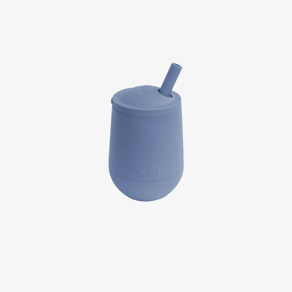The Mini Cup + Straw in Indigo by ezpz / Silicone Drinking Cup and Straw Training System for Toddlers