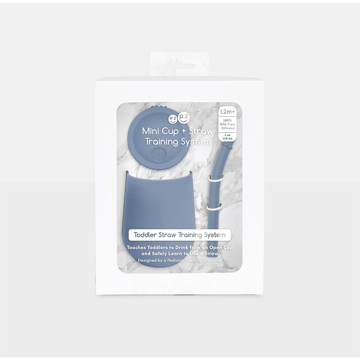 The Mini Cup + Straw in Indigo by ezpz / Silicone Drinking Cup and Straw Training System for Toddlers