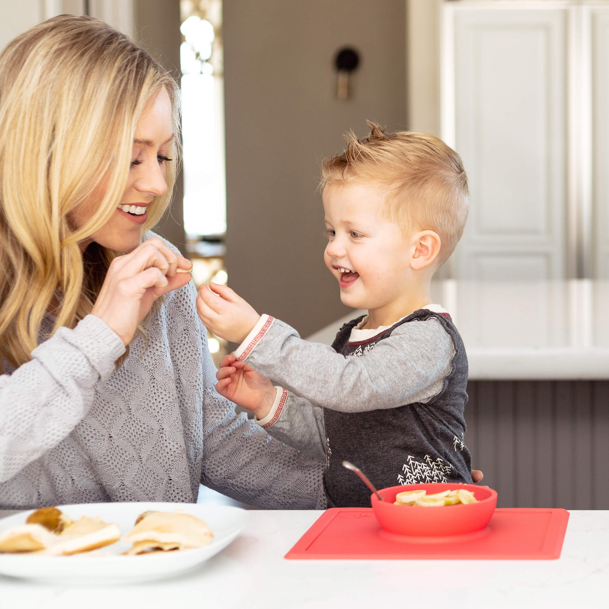 Happy Bowl in Coral by ezpz / The Original All-In-One Silicone Plates & Placemats that Stick to the Table