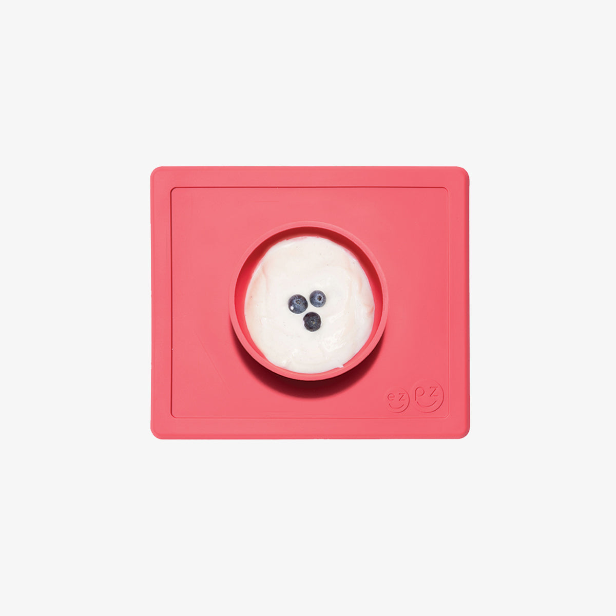 Happy Bowl in Coral by ezpz / The Original All-In-One Silicone Plates & Placemats that Stick to the Table