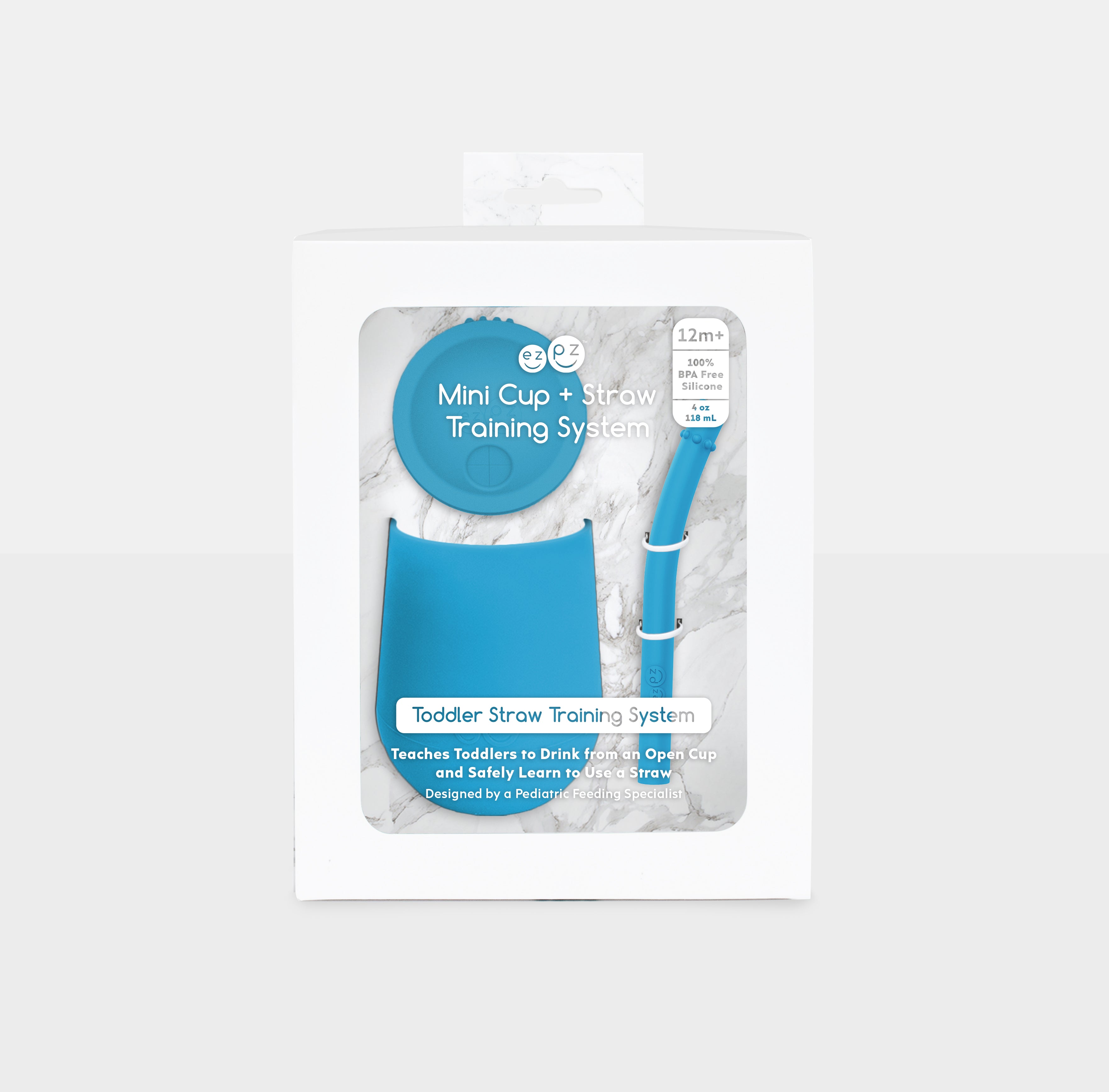 The Mini Cup + Straw in Blue by ezpz / Silicone Drinking Cup and Straw Training System for Toddlers