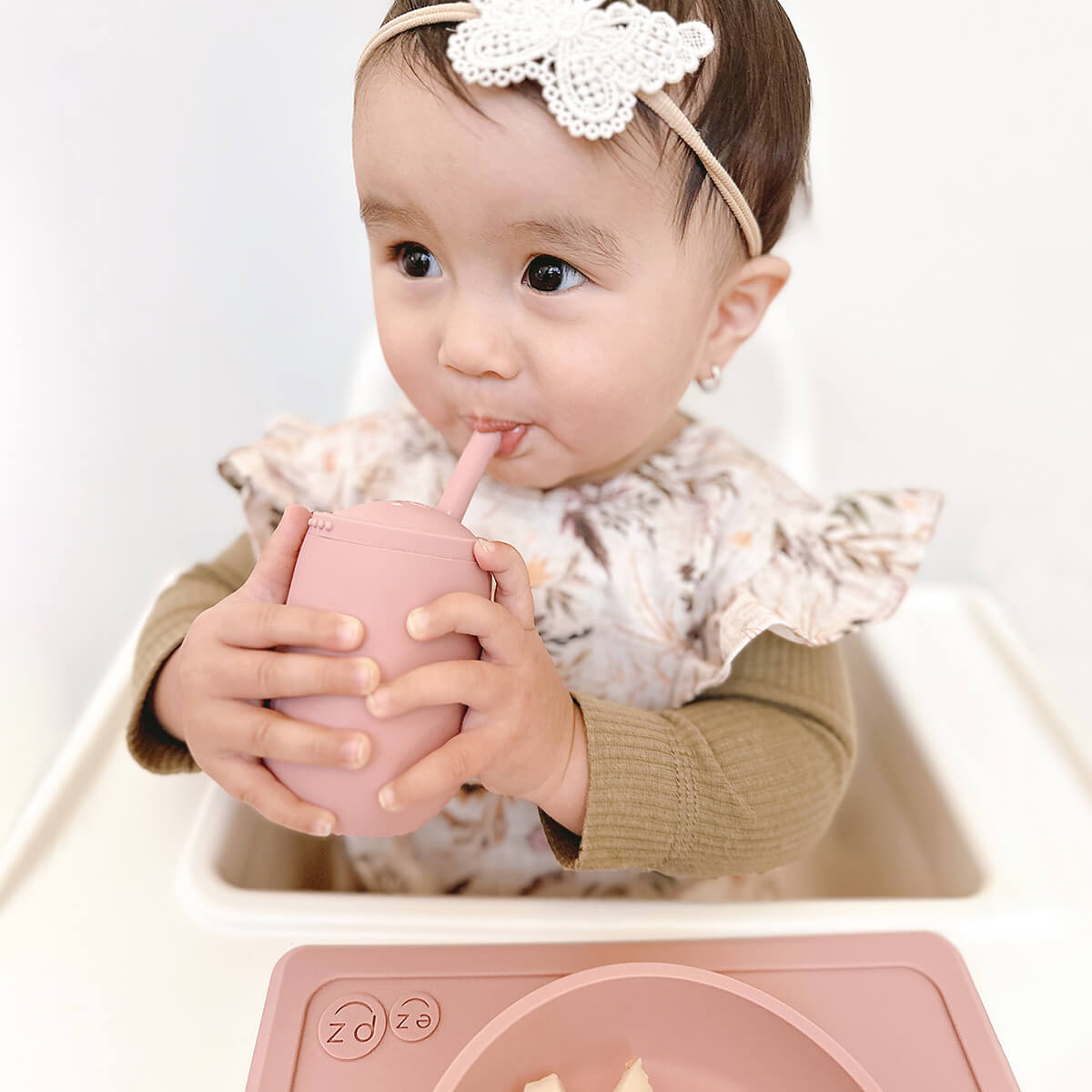The Mini Cup + Straw in Blush by ezpz / Silicone Drinking Cup and Straw Training System for Toddlers