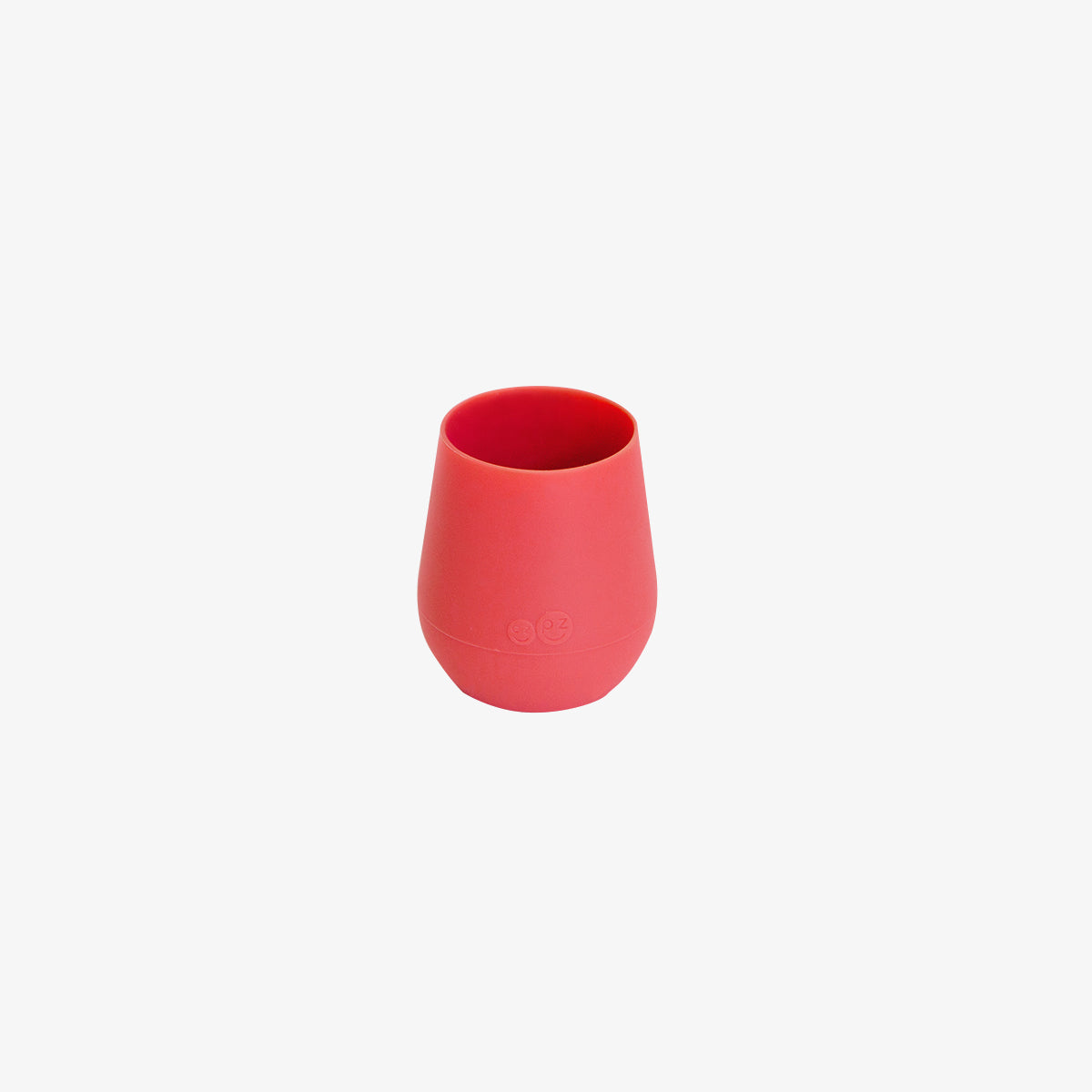 The Tiny Cup in Coral Pink by ezpz / Open-Top, Silicone Drinking Cup for Babies to Learn to Drink