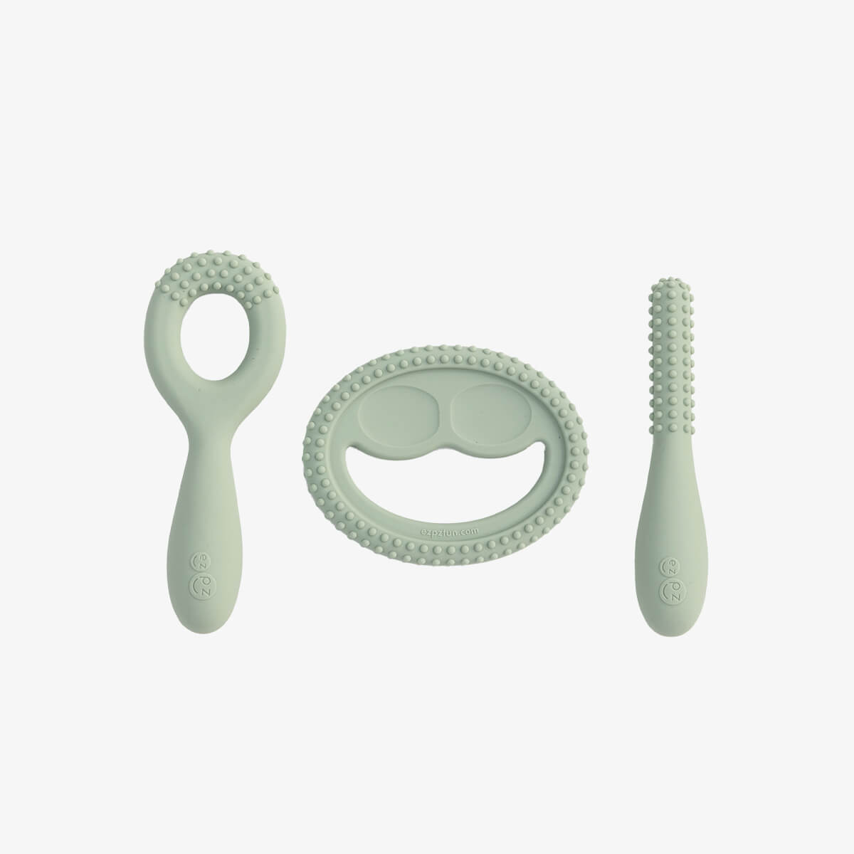 ezpz oral development tools in sage green / silicone teethers for motor skill development