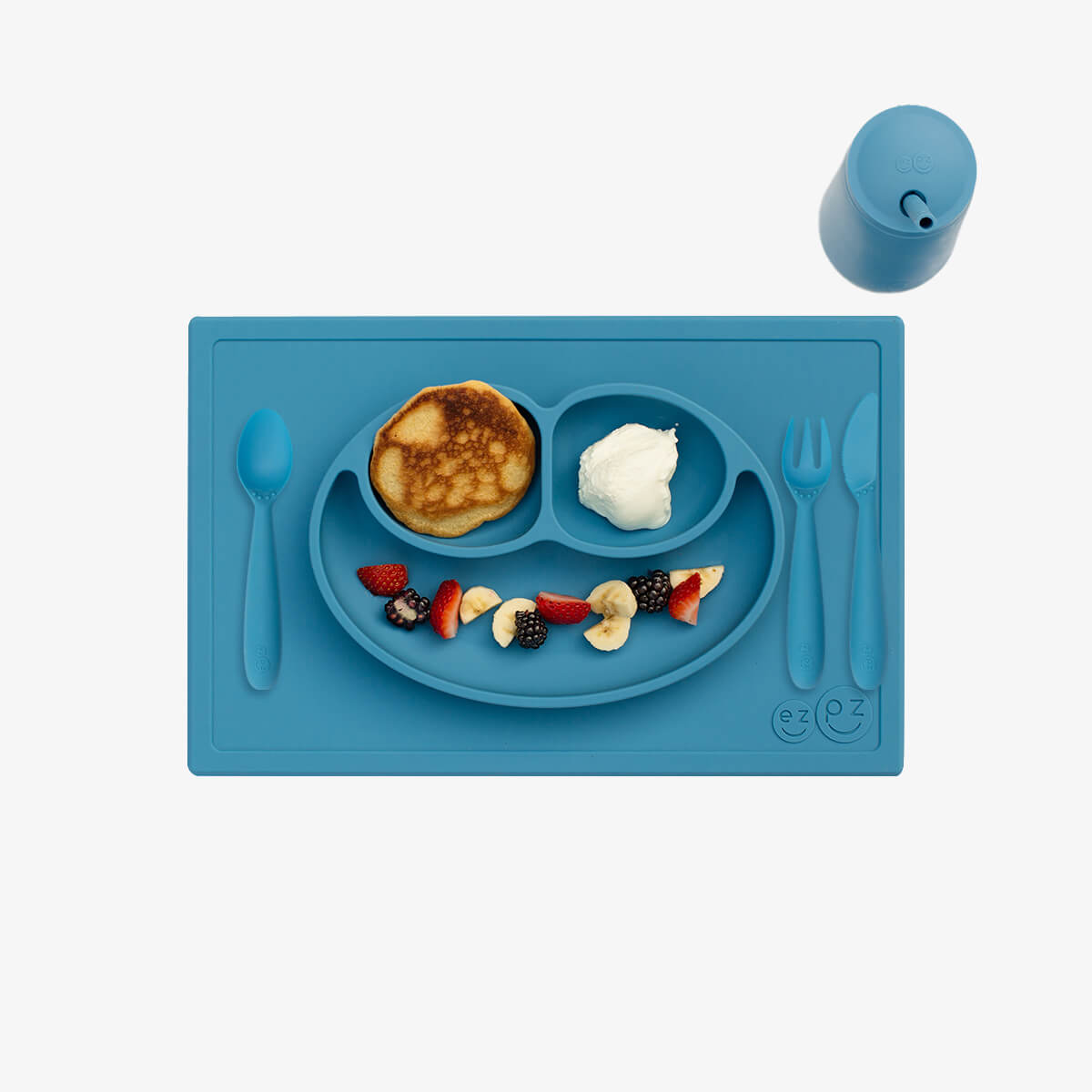 ezpz Happy Feeding Set in Blue / Silicone, Self-Suctioning Plate, Silicone Cup and Straw, Training Utensils for Toddlers