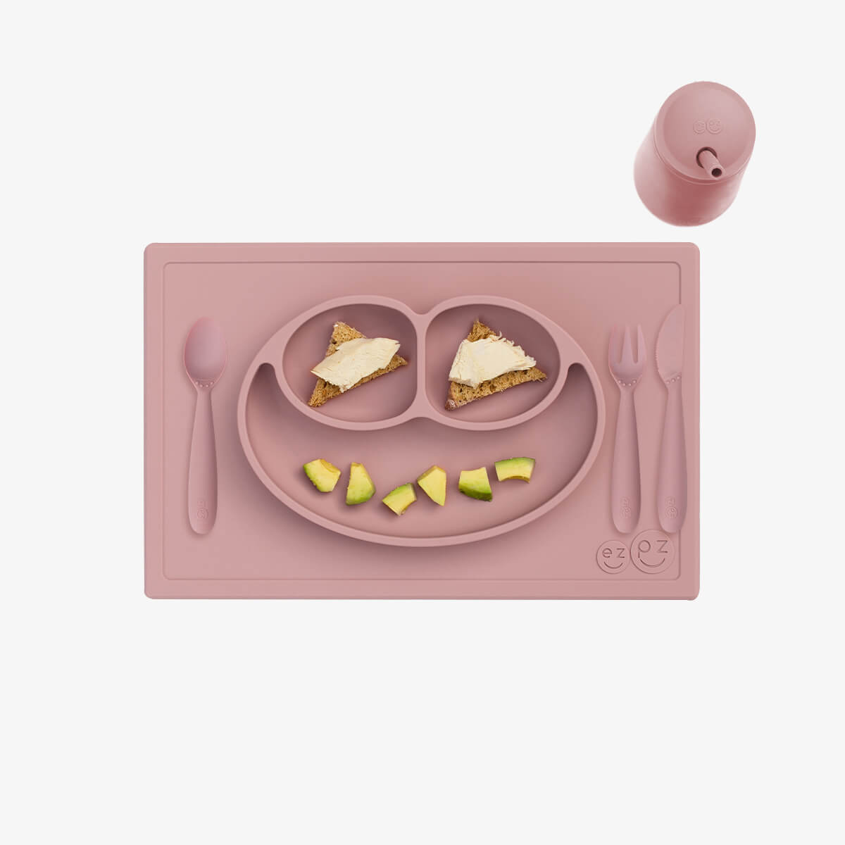 ezpz Happy Feeding Set in Blush / Silicone, Self-Suctioning Plate, Silicone Cup and Straw, Training Utensils for Toddlers