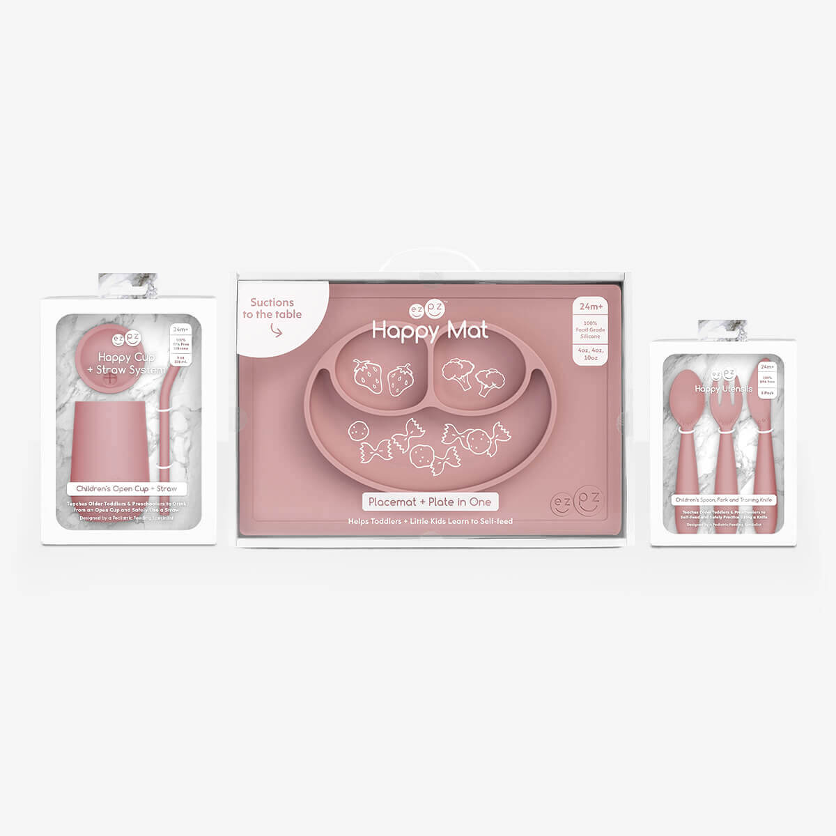 ezpz Happy Feeding Set in Blush / Silicone, Self-Suctioning Plate, Silicone Cup and Straw, Training Utensils for Toddlers