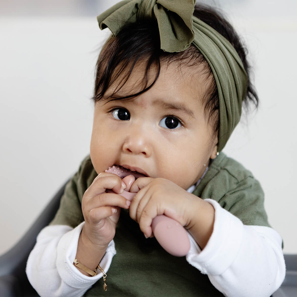 ezpz oral development tools in blush pink / silicone teethers for motor skill development