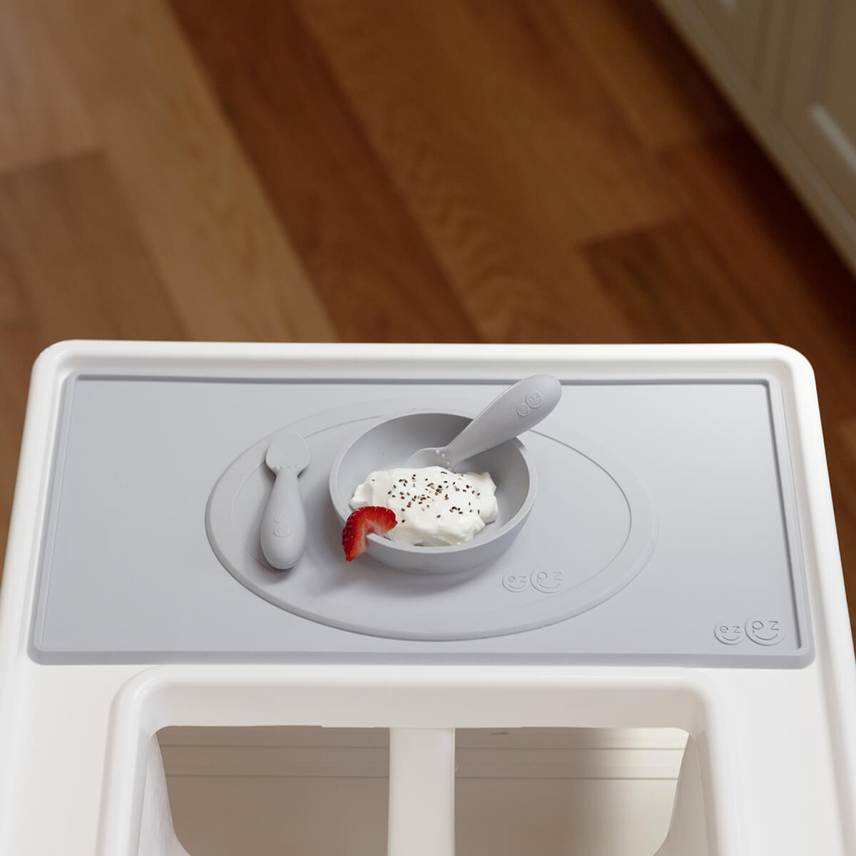 The Tiny Placemat in Pewter is a non-slip, silicone placemat that fits on most highchair trays