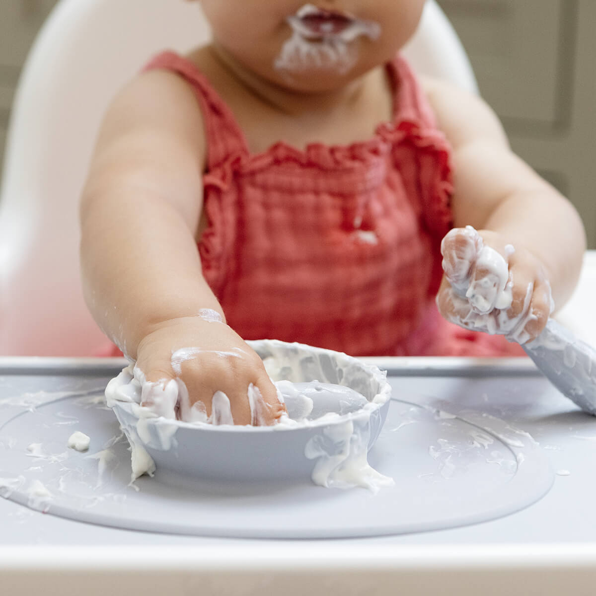 The Tiny Placemat in Pewter is a non-slip, silicone placemat that fits on most highchair trays