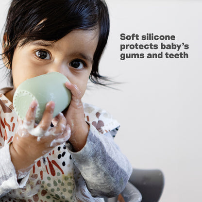 The Tiny Cup by ezpz is made of soft silicone that protects baby's gums and teeth