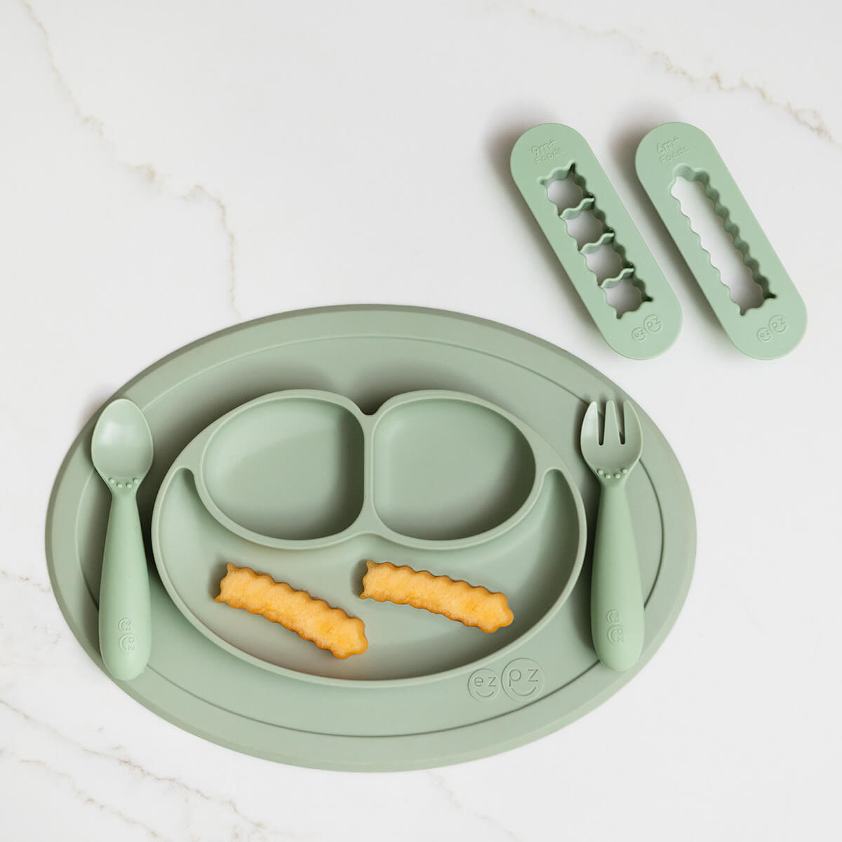 ezpz Mini Feeding Set and Baby Led Weaning Food Cutters in Sage Green