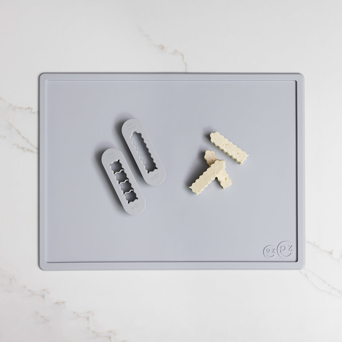 ezpz Mini Placemat in Pewter Gray and Baby-Led Weaning Food Cutters Bundle for starting solids