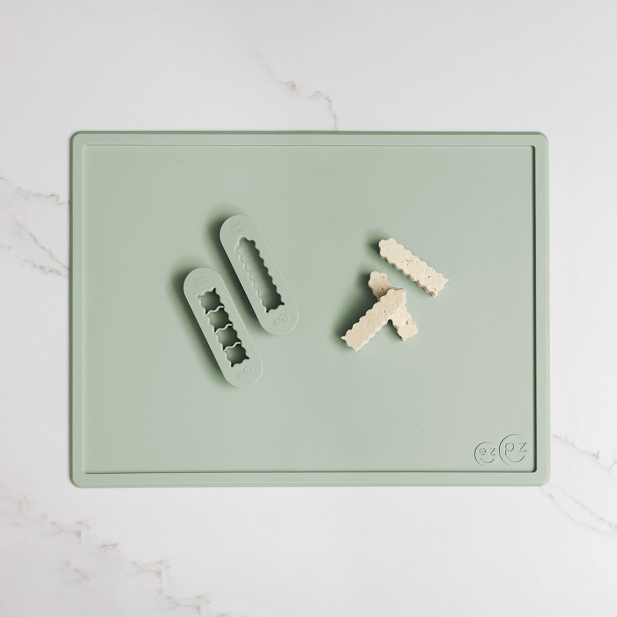 ezpz Mini Placemat in Sage Green and Baby-Led Weaning Food Cutters Bundle for starting solids