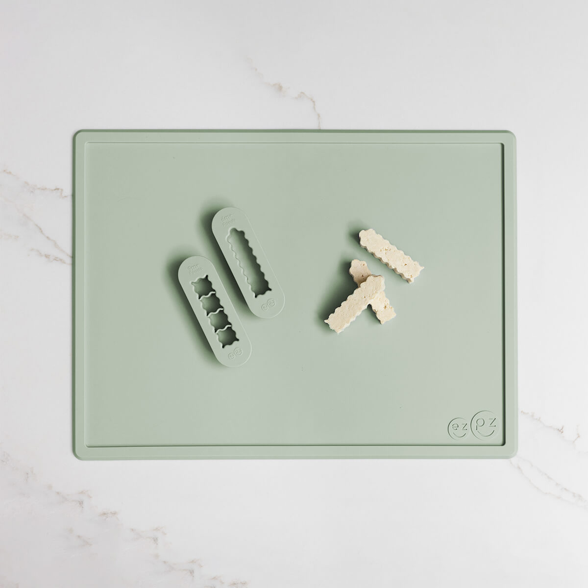 ezpz Baby-Led Weaning Food Cutters in Sage Green / 6 months and 9 months feeding milestones