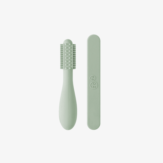 ezpz baby led toothbrush and sensory tongue depressor in sage green