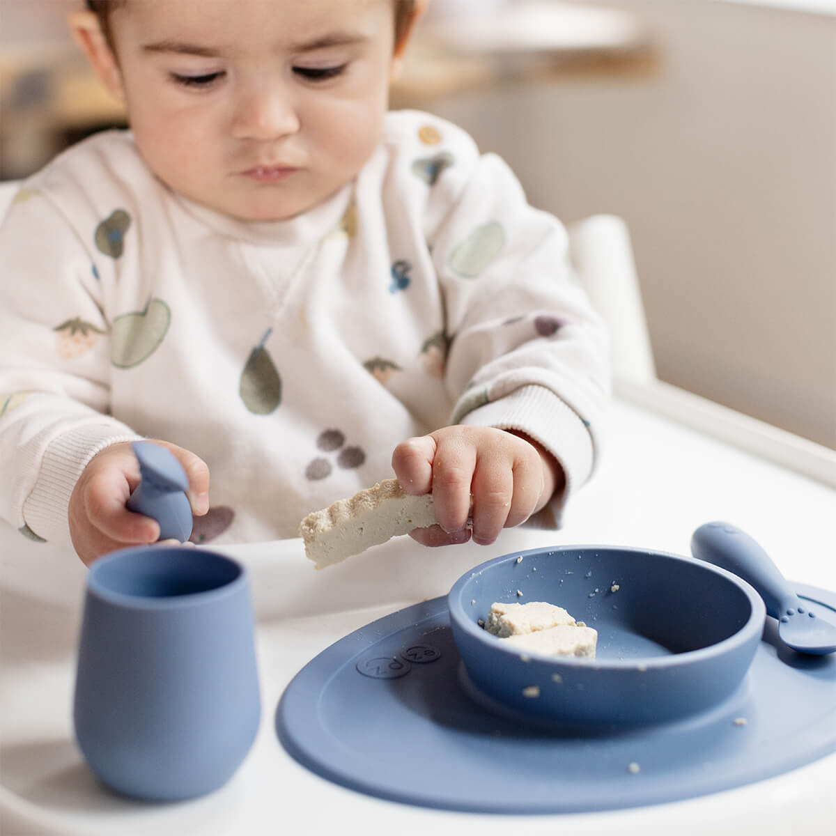 First Foods Set in Pewter by ezpz / The Original All-In-One Silicone Plates & Placemats that Stick to the Table#color_indigo