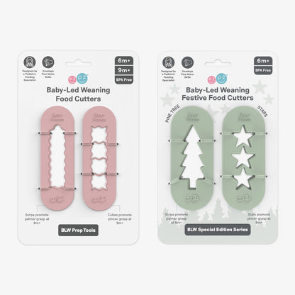 ezpz Baby-Led Weaning Festive Food Cutters to cut baby food into star and tree shapes Christmas-themed 