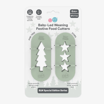 ezpz Baby-Led Weaning Festive Food Cutters to cut baby food into star and tree shapes Christmas-themed