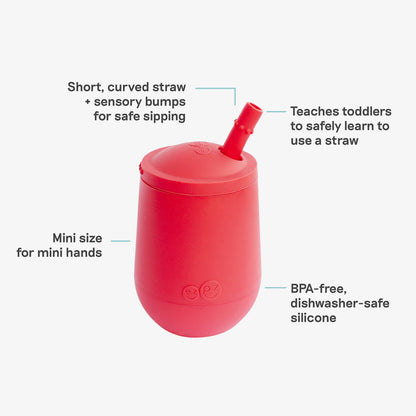 The Mini Cup + Straw in Coral by ezpz / Silicone Drinking Cup and Straw Training System for Toddlers 