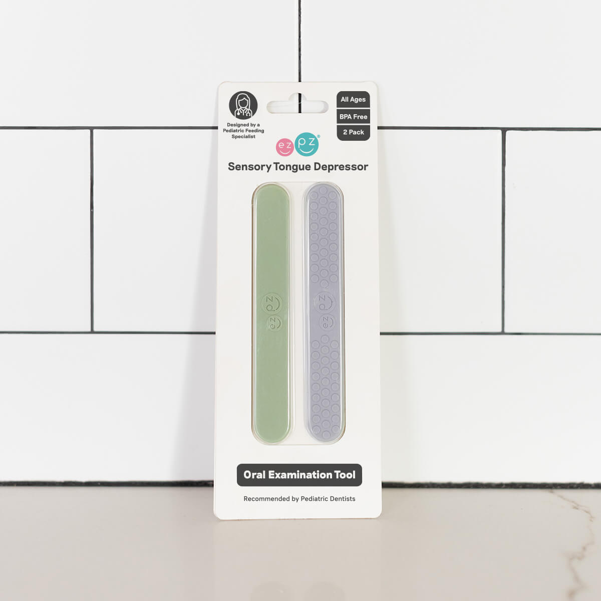 ezpz sensory tongue depressor in sage green and pewter gray / silicone tongue depressor for babies