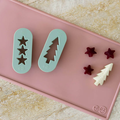 ezpz Baby-Led Weaning Festive Food Cutters to cut baby food into star and tree shapes Christmas-themed