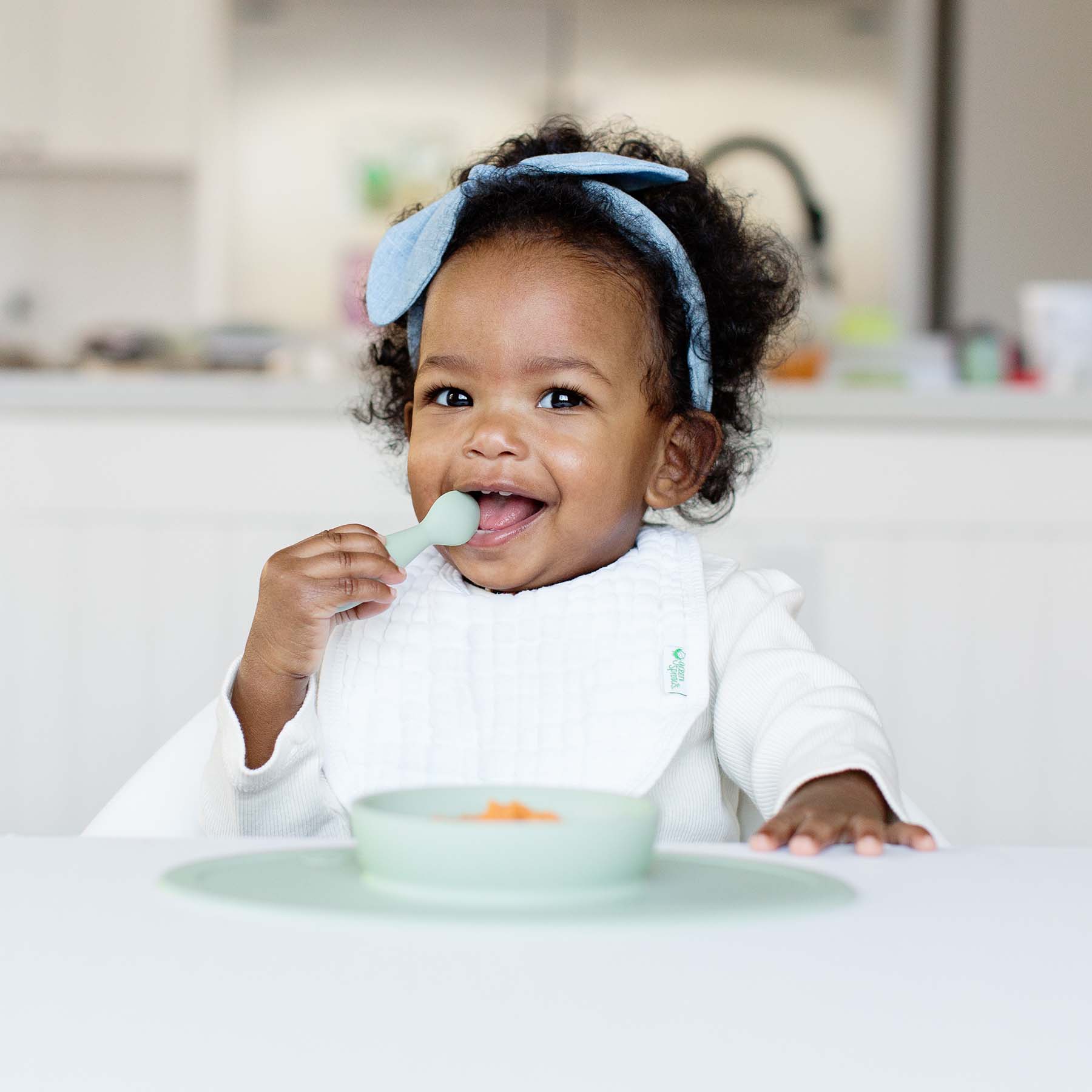ezpz First Foods Set includes a silicone bowl, cup, and spoons for baby-led weaning and eating skill development for babies