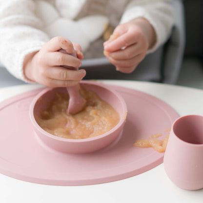 ezpz First Foods Set includes a silicone bowl, cup, and spoons for baby-led weaning and eating skill development for babies