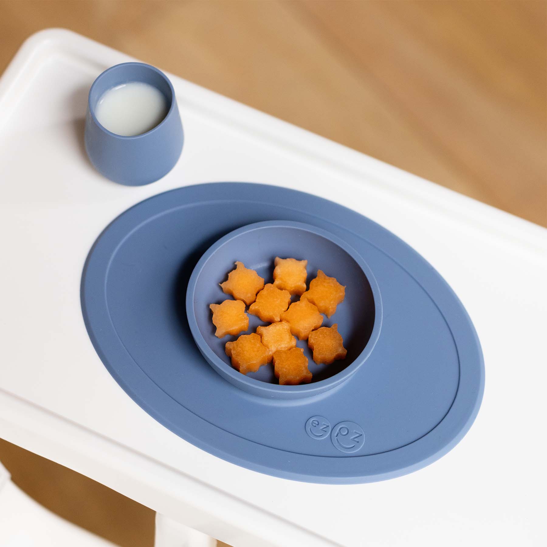 ezpz First Foods Set includes a silicone bowl, cup, and spoons for baby-led weaning and eating skill development for babies