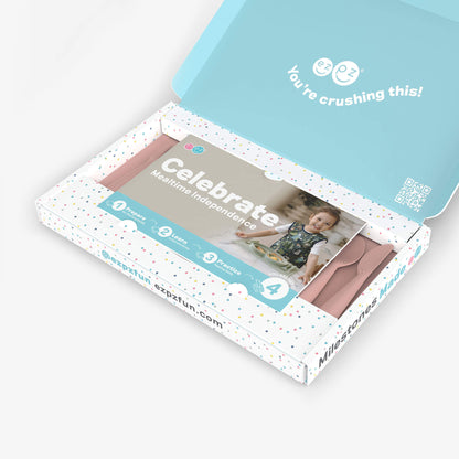 ezpz Kit 4 - Celebrate Mealtime Independence in Blush Pink includes the Happy Mat, Happy Utensils, and Micro Mat 