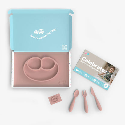 ezpz Kit 4 - Celebrate Mealtime Independence in Blush Pink includes the Happy Mat, Happy Utensils, and Micro Mat 