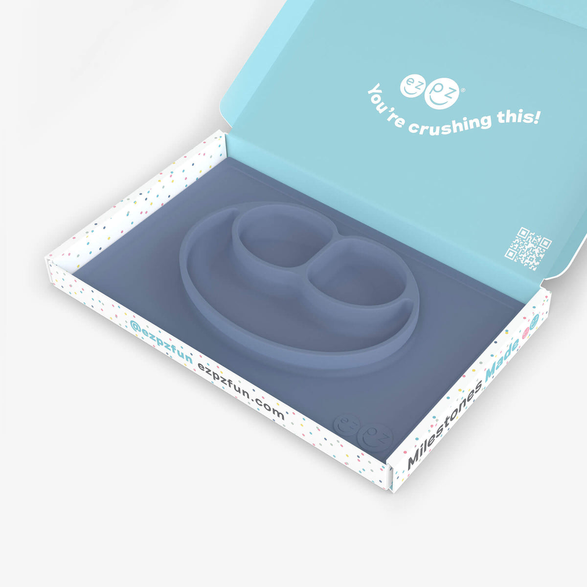 ezpz Kit 4 - Celebrate Mealtime Independence in Indigo Blue includes the Happy Mat, Happy Utensils, and Micro Mat 
