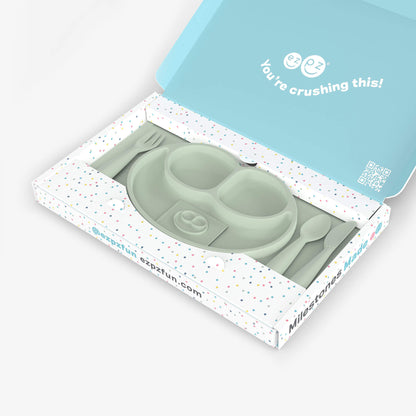 ezpz Kit 4 - Celebrate Mealtime Independence in Sage Green includes the Happy Mat, Happy Utensils, and Micro Mat 